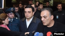 Armenia - Transport and Communications Minister Gagik Beglarian (R) speaks to reporters at Zvartnots airport near Yerevan, 5Nov2015.