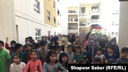 افغان ماشومان او ښځې په ابوظبۍ کمپ کې/د تېر کال عکس