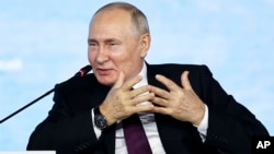 Russian President Vladimir Putin speaks in Vladivostok on September 12.