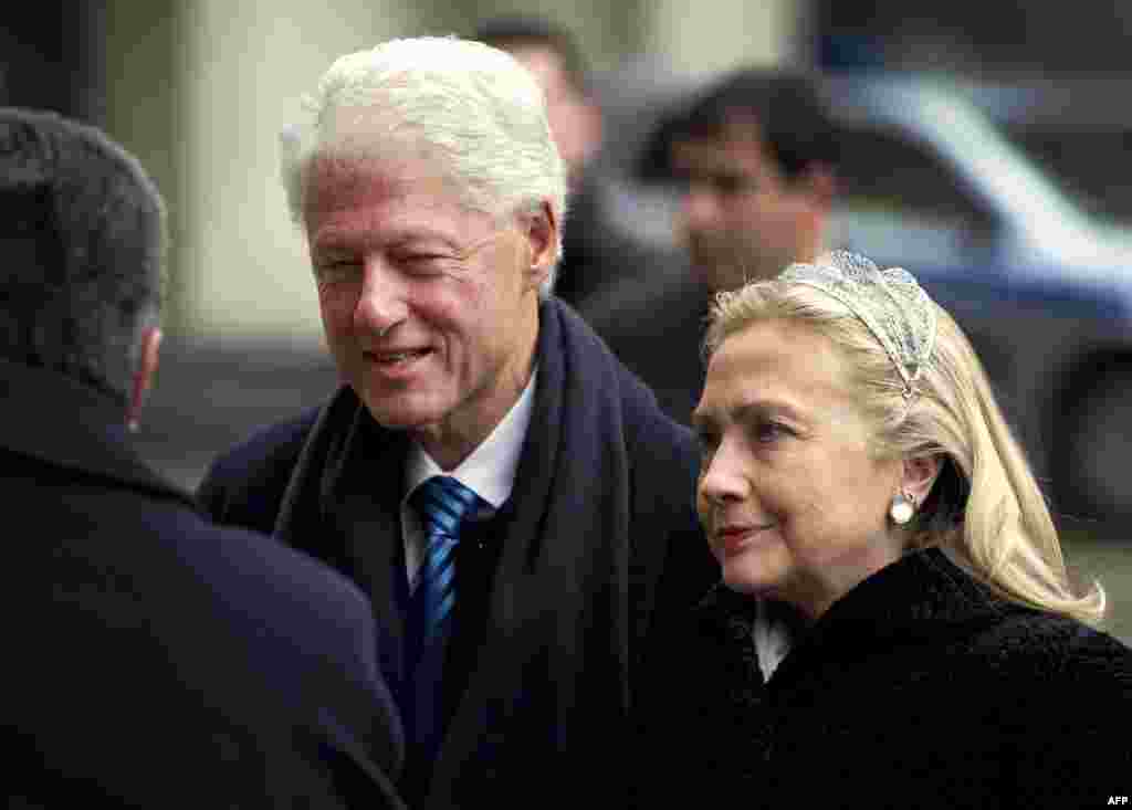 Czech Republic - Former US President Bill Clinton (R) and US Secretary of State Hillary Clinton arrive for the funeral service for former Czech president Vaclav Havel in Prague, 23Dec2011