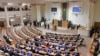 This handout photograph taken on November 25, 2024 and released by the press service of the Parliament of Georgia shows a general view of Georgia's new Parliament as it holds its first session in Tbilisi on November 25, 2024.