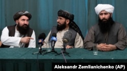 Members of the Taliban delegation attend a high-level Afghan peace conference in Moscow on March 19.