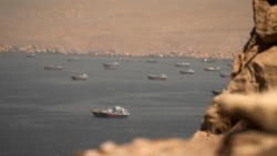 Vessels in the Strait of Hormuz, as seen from Musandam, Oman, on June 18.
