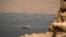 Vessels in the Strait of Hormuz, as seen from Musandam, Oman, on June 18.