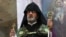 Armenia -- Archbishop Navasard Kchoyan leads a ceremony in St. Sargis Church, Yerevan, September 2, 2014.