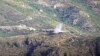 Azerbaijan -- A video grab shows the smoke from the explosions of the shelling by Armenian forces of an Azerbaijani army position in the Tovuz region, July 14, 2020.