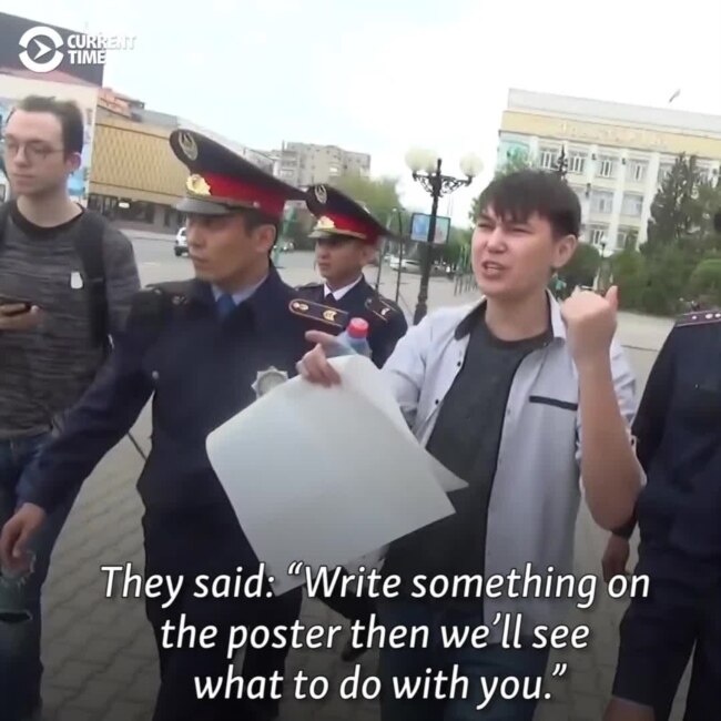 Meta Protest: Kazakh Man Detained Holding Blank Poster