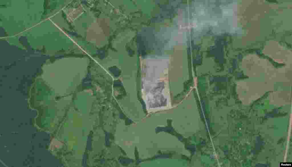 Smoke rises from a Wildberries facility in Aleksin, Russia, on August 6. Another image from the European Union's Copernicus Sentinel-2 satellite shows the facility before the attack on July 19.