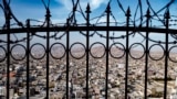 A view of Kabul through a wall fence on the Wazir Akbar Khan hilltop in the Afghan capital.&nbsp;