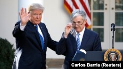 Donald Tramp i šef Feda Džerom Pauel 