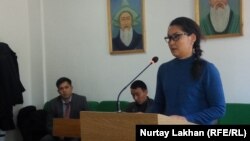 Qaisha Aqan speaks in the courtroom in Almaty in November 2019.