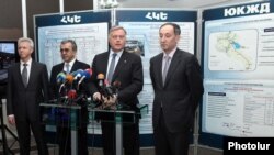 Armenia - Vladimir Yakunin (second from right), chairman of Russia's state-run rail network, speaks to journalists in Yerevan, 15Feb2012.