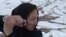 Afghanistan -- fghan member of a Wushu martial arts group poses for a photograph at the Shahrak Haji Nabi hilltop overlooking Kabul on January 29, 2017