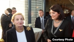 Kosovo President Atifete Jahjaga and former U.S. Secretary of State Madeleine Albright at the women's conference in Pristina.