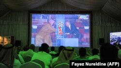 Saudi soccer fans watch World Cup festivities in Russia at a fan tent in the capital Riyadh.