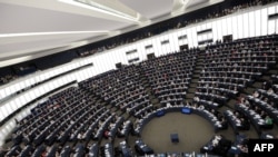 France -- Members of the EU Parliament take part in a voting session on July 3, 2013 during a session of the European Parliament in the eastern French city of Strasbourg.