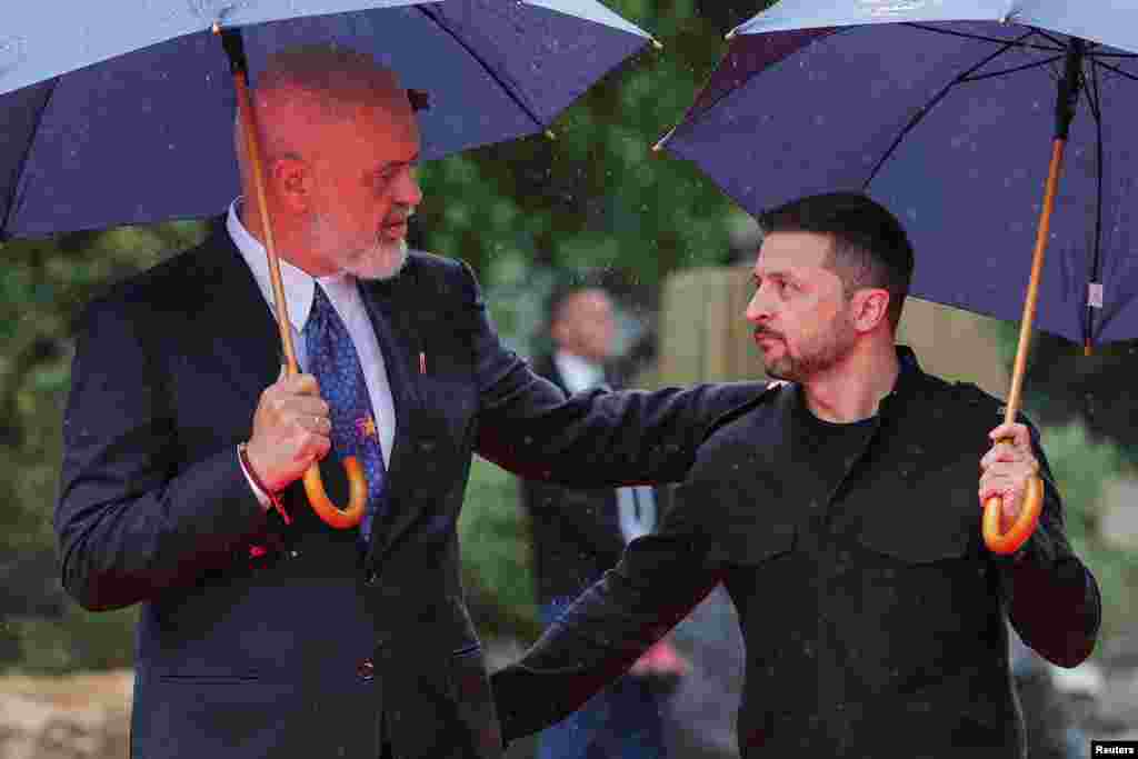 Albanian Prime Minister Edi Rama welcomes Ukrainian President Volodymyr Zelenskyy during the European Political Community Summit at Skanderbeg Square in Tirana, Albania, on May 16.