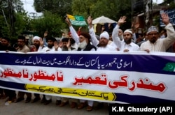 Members of a Sunni religious group protest against the construction of the Hindu temple at a demonstration in Lahore on July 12.