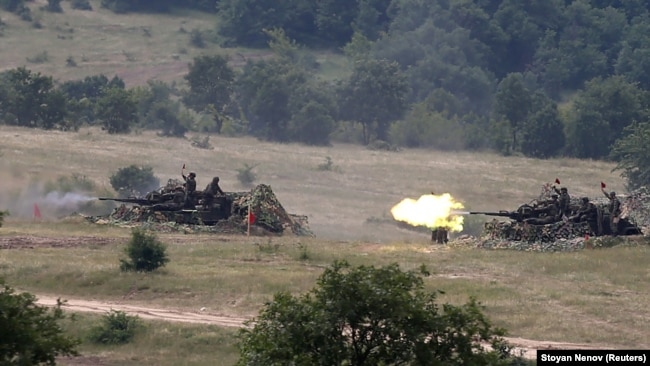 Bulgarian soldiers fire during the Strike Back 21 military drill at the Koren training grounds in Bulgaria in 2021.