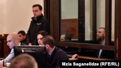 GEORGIA -- Jack Shepherd, who went on the run last year after killing a woman in a speedboat crash on the River Thames, attends court hearing in Tbilisi. 25Jan2019