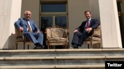 The picture shows Russian Ambassador Levan Dzhagaryan (left) and British envoy Simon Shercliff sitting where Soviet leader Joseph Stalin and British Prime Minister Winston Churchill sat at the Russian Embassy during the 1943 Tehran Conference.