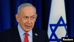 Israeli Prime Minister Benjamin Netanyahu speaks reporters on March 19.