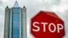 RUSSIA -- A traffic sign stands next to the Moscow office of Russian gas giant Gazprom in Moscow, September 10, 2021