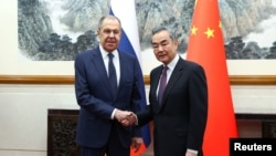 Міністри закордонних справ Росії і Китаю Сергій Лавров і Ван Ї у Пекіні, 9 квітня 2024 року