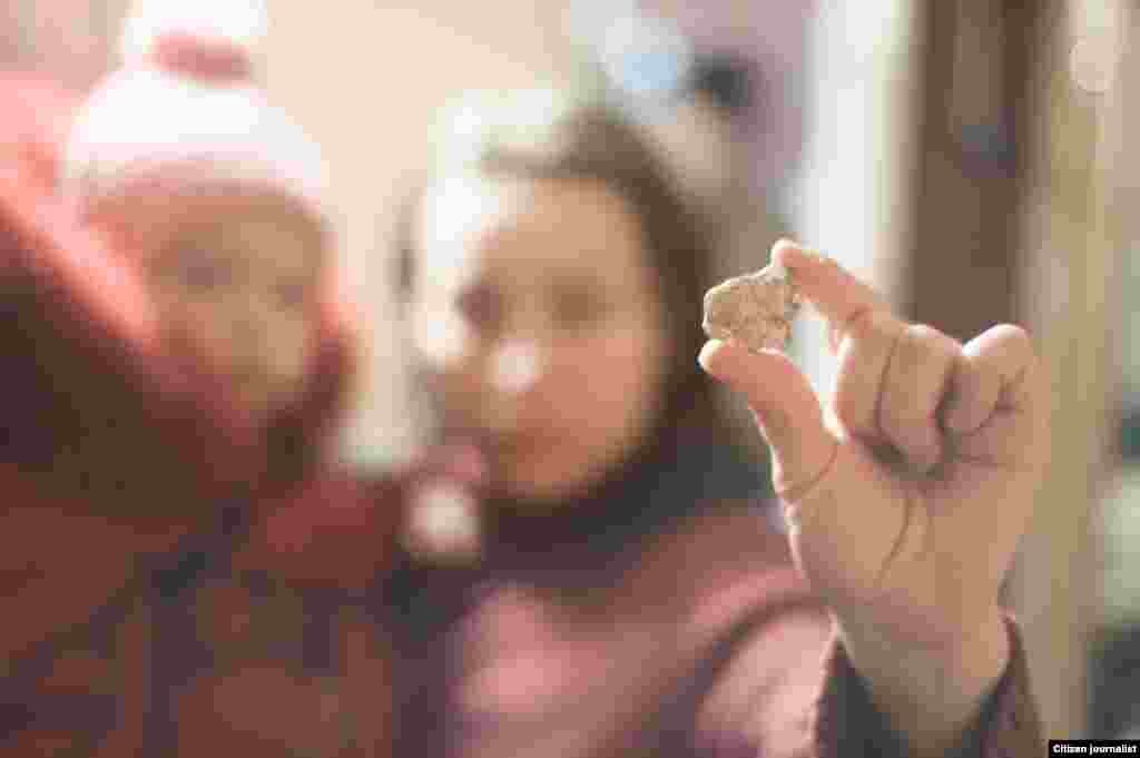 Donetsk, Ukrain. Several artillery shells hit the very city centre, which has never happened before. It is the last day befor ceasefire. Lyuda and her daughter Olya Desyaterik. Their appartment was hit by two pieces of artillery shell which explouded in a