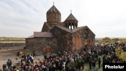 Armenia - People leave the Hovanavank monastery after attending a mass held by a defrocked priest, October 19, 2025.