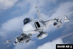 Egy Saab JAS–39 Gripen – Svédország számára évtizedeken át nem volt ellentmondás a semleges és a jelentős fegyverexportőr státusz között