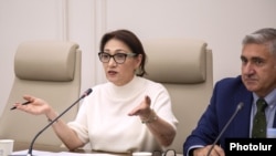 Armenia - Lilit Galtsian (left), chairwoman of the parliament committee on human rights, chairs a meeting in Yerevan, September 23, 2025.