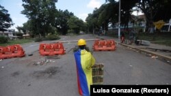 Demonstrant na barikadi u Kaliju, 13. maj 2021.