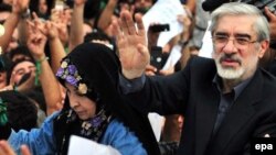 Mir Hossein Musavi (right) at a protest rally in Tehran on June 18.