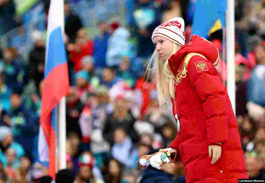 Russia's Varvara Voronchikhina of Russia celebrates winning silver in a slalom skiing event on March 12. The International Paralympic Committee (IPC) has allowed Russian athletes to compete under their country's flag at the games for the first time since 2014.