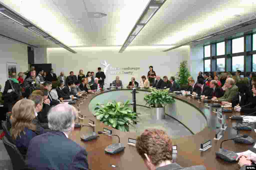 Former Czech President Vaclav Havel presides over the first official editorial meeting at the new headquarters, 2009.