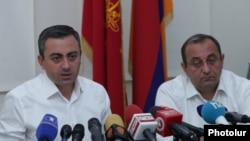 Armenia - Ishkhan Saghatelian (L) and Artsvik Minasian, leaders of the Dashnaktsutyun party allied to former President Robert Kocharian, hold a news conference in Yerevan, July 6, 2021.