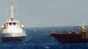 An Iranian boat heads toward a U.S. patrol craft on July 25. Another incident occurred on July 28.