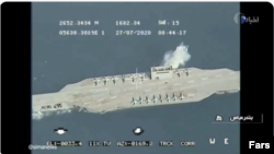 Iranian Cruise missile targeting the replica of a U.S. aircraft carrier in the Persian Gulf during military excercises dubbed as Great Prophet-14 (Payambar-e Azam 14). Screen grab from IRIB. July 28, 2020. 