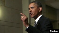 АҚШ президенті Барак Обама журналистерге сұхбат беріп тұр. Вашингтон, 31 шілде 2013 жыл.