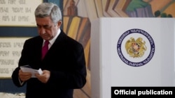 President Serzh Sarkisian about to cast his ballot on February 18.