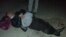 Ikramidin Aitkulov lies on the ground after the attack, from image on Facebook page of his brother Khansari Aitkulov.