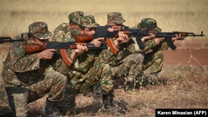 Heavy fighting breaks out between Armenia and Azerbaijan, raising fears of  war