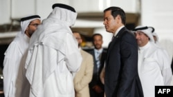 Bahrain's foreign minister, Abdullatif bin Rashid al-Zayani (left), greets US Secretary of State Marco Rubio upon his arrival in Bahrain on June 24. 