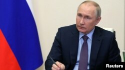 Vladimir Putin la o reuniune dedicată din sectorul energetic al Rusiei, Moscova, 14 aprilie