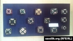 Traditional Uzbek skullcaps on display in the country's Museum of Applied Arts. As cheap Chinese versions of these types of products become more widely available, some fear that museums will soon be the only place where traditional craft items like these can be found. 