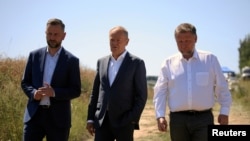 Լեհաստանի վարչապետ, ներքին գործերի նախարարy և պաշտպանության նախարարը այն վայրում, որտեղ ԱԹՍ էր ընկել