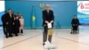 Kazakh President Qasym-Zhomart Tokayev casts his vote in Astana on October 6 during a referendum on the construction of a nuclear power plant. 