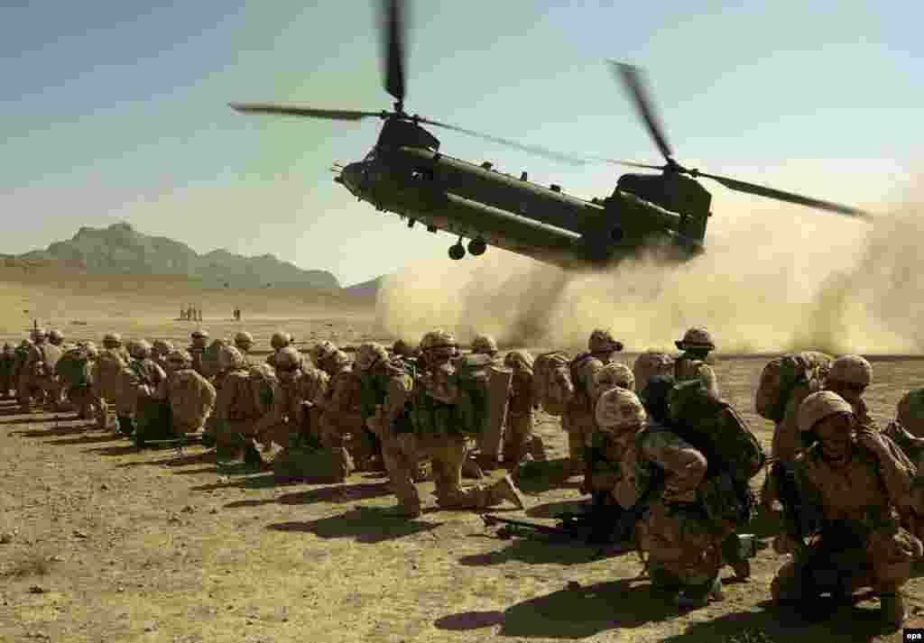 British Royal Marines land at the site of a major clash near Nawzad in Helmand Province in October (British Defense Ministry) - October marked the fifth anniversary of the military intervention in Afghanistan. During that period some progress was noted -- for children, for women, for the economy, for politics -- but an upsurge in violence threatens those achievements. NATO extended its control in the south, but the region still experiences daily violence and constant insecurity.