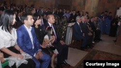 Armenia - Prime Minister Hovik Abrahamian and his son Argam (second from left) attend the consecration of a church built by them in Artashat, 31 May2015.